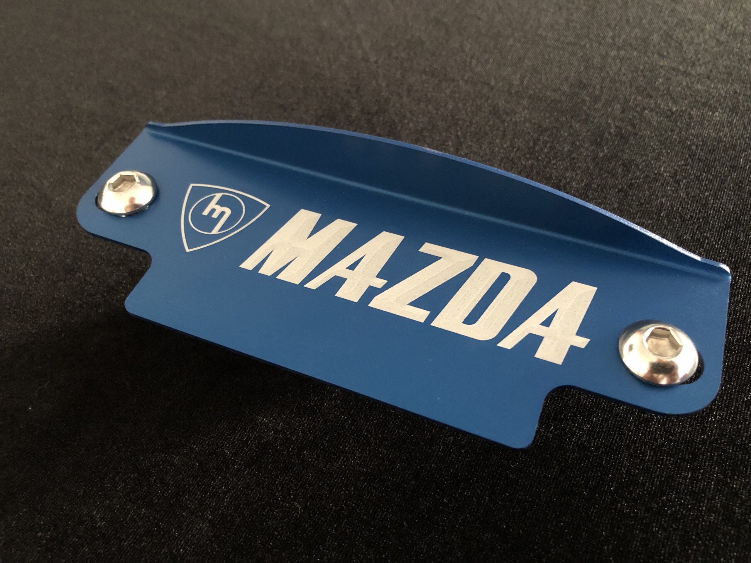 Blue M Mazda flywheel cover