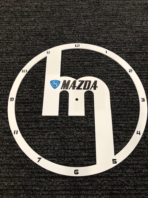 White M Clock